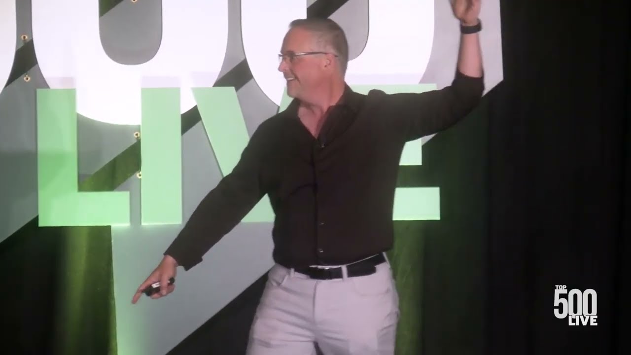 Chuck Thokey teaching on stage at Qualified Remodeler TOP 500 LIVE